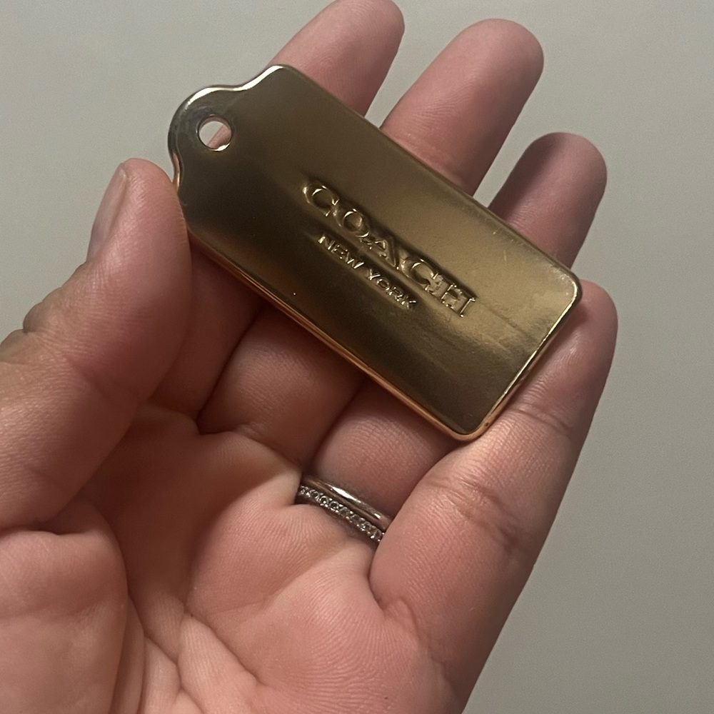 Coach Gold Bar Tag.